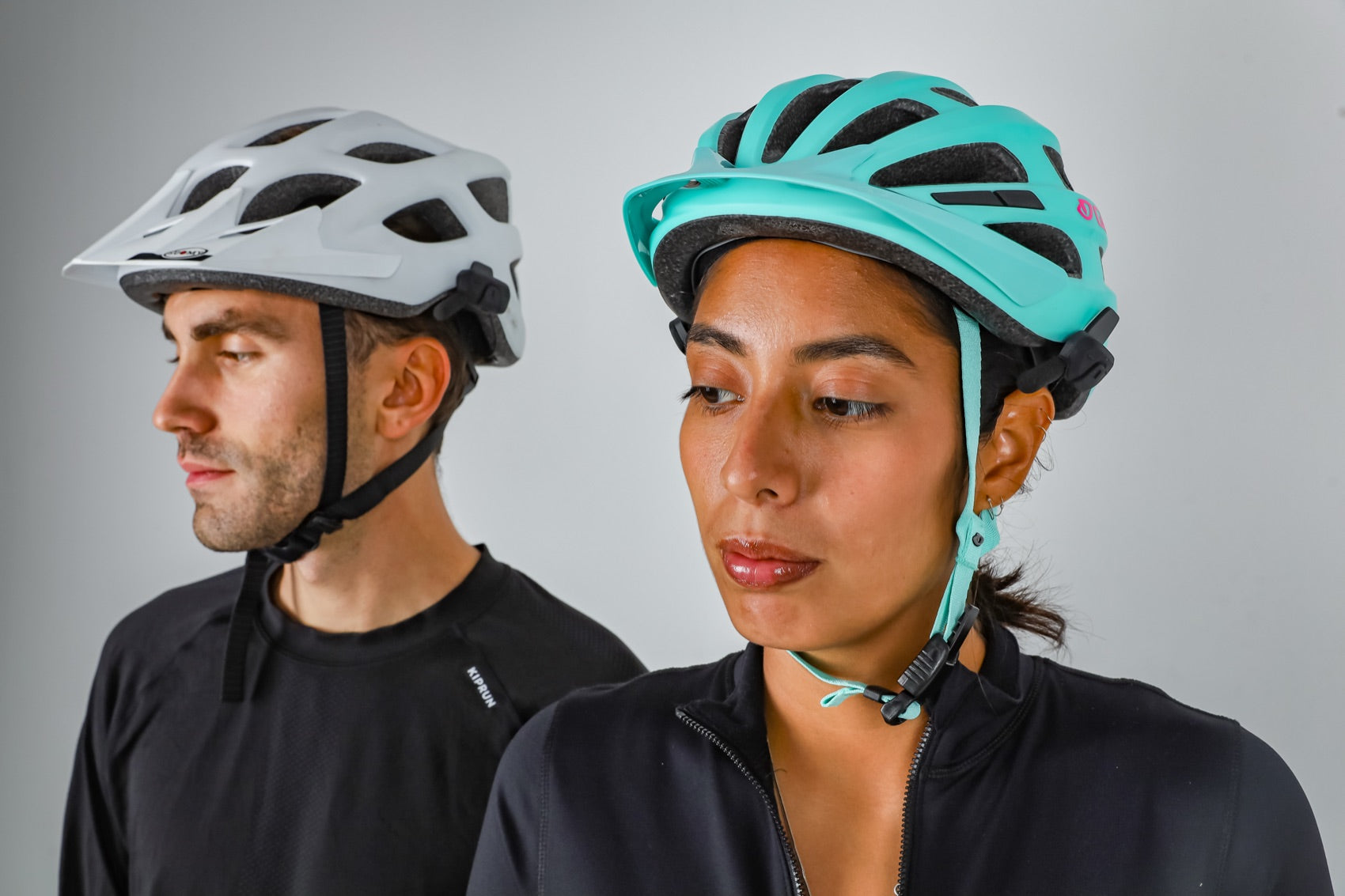 Two cyclists wearing Roamee, ready to talk